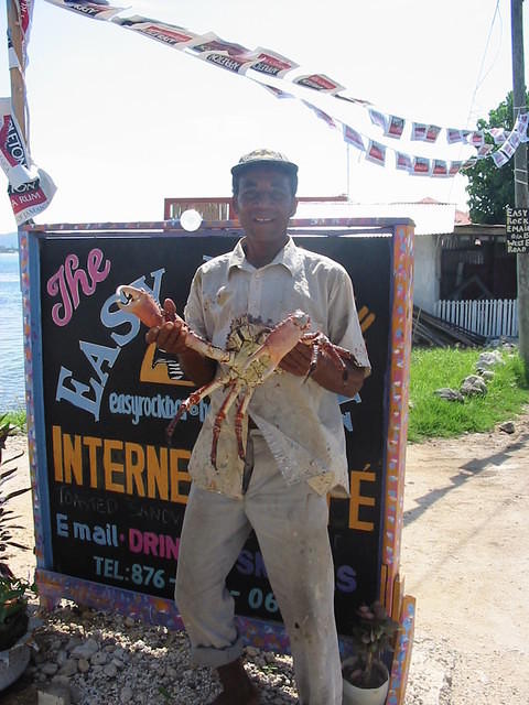 Local Fisherman Les selling Sue a King Crab