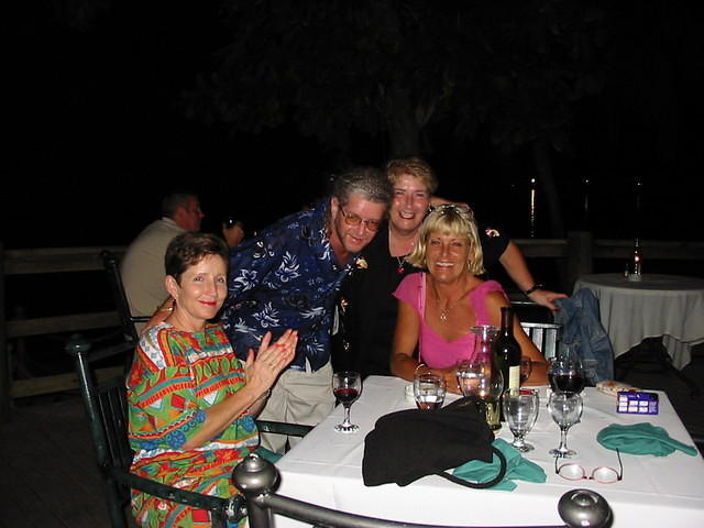 Shorty, Likkle One, Scotty & Sue celebrate (courtesy of Sandals Resort) getting down computers for Whitehall School all the