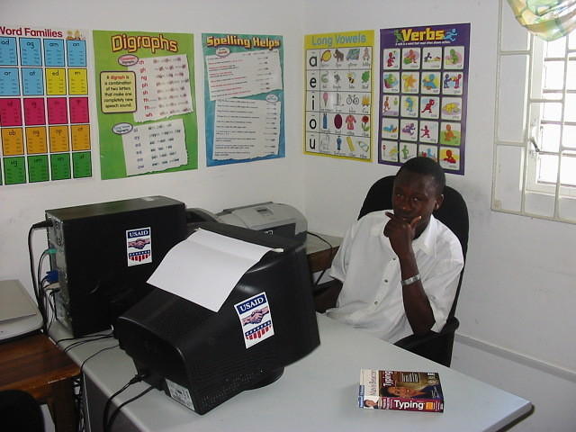 Marlo using Computer Learning CD's to improve his typing skills