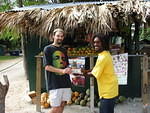 JJ selling one of his delicious pineapples
