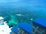 Swimming off Blue Cave Castle