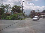 Before the Texaco Station, turn left. You can see a sign for Roaring river.