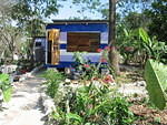 Half House gets it's verandah converted into a second room with lots of shutters so it has maximum light December 2003