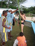 After the wedding lunch Mrs Biggs gives a hand to construct the wedding arch ..