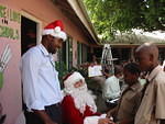 Sandals Negril bring Santa with presents for all the children, plus food for children & teachers too!