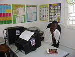 Marlo using Computer Learning CD's to improve his typing skills